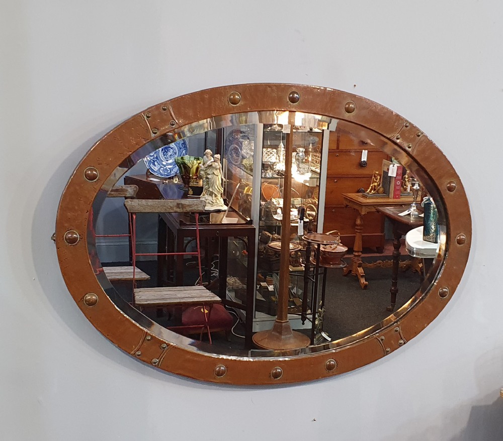 LARGE LIBERTY STYLE ARTS CRAFTS HAMMERED COPPER OVAL MIRROR C1910 large liberty style arts crafts hammered copper oval mirror c1910