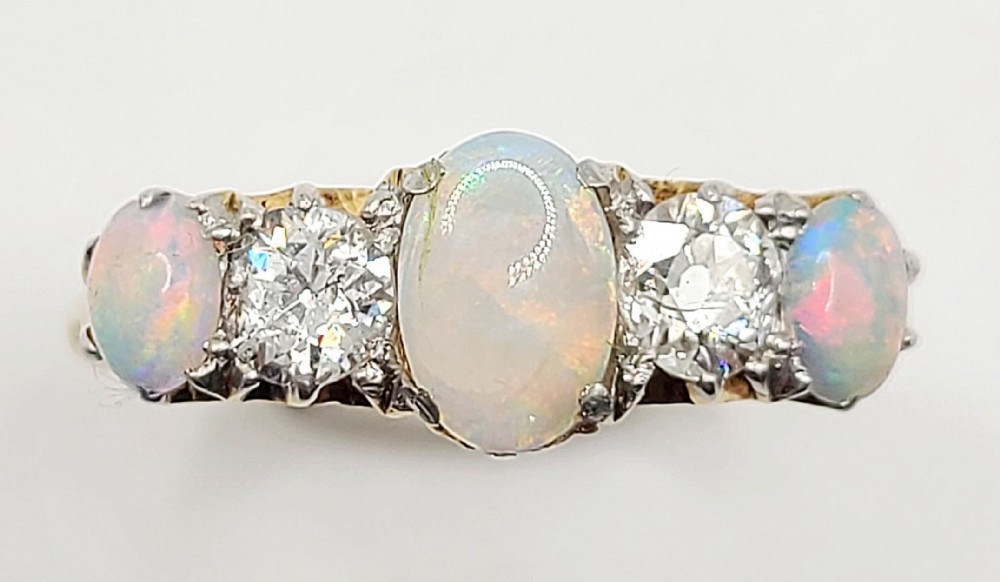 victorian 125ct opal 05ct diamond 18ct gold ring size o