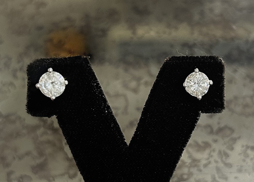 pair of 2ct diamond solitaire earrings on 18ct white gold