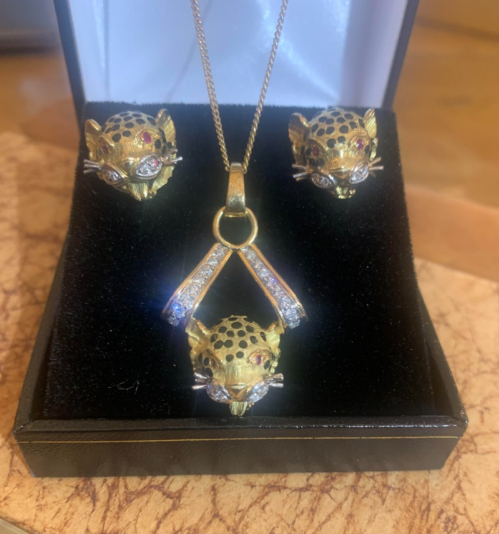 exceptional ruby diamond and enamel leopard 18ct gold stud earring and pendant set